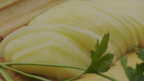 Cutting fresh potato Stock Footage 98296134