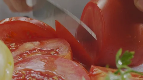 Cutting fresh tomato Stock Footage 98296897