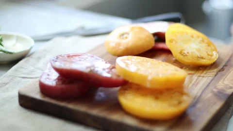 Cutting fresh tomatoes, home kitchen, 4k, real time, cinematic Stock Footage 248542328