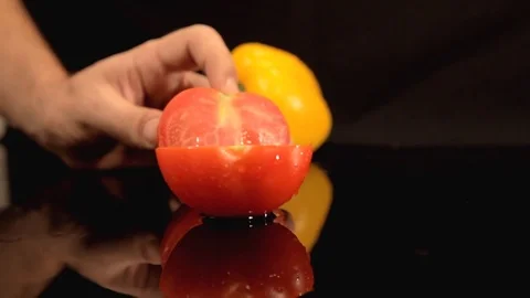 Cutting Fresh Vegetables - Tomato Stock Footage 76471777