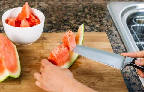 Cutting fresh watermelon Stock Photos