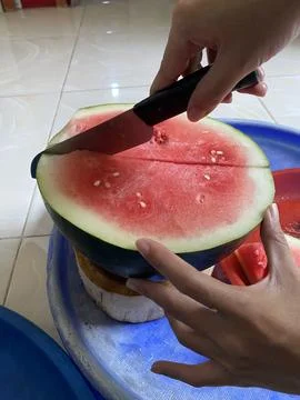 Cutting a Fresh Watermelon Stock Photos