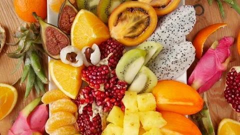 Cutting fruit on the table. Stock Footage 232026741