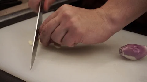 Cutting garlic and onion Stock Footage 113527593