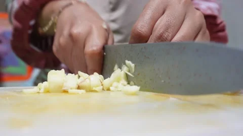 Cutting garlic Stock Footage 285992229