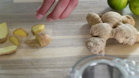 Cutting ginger slow-motion Stock Footage 142515601