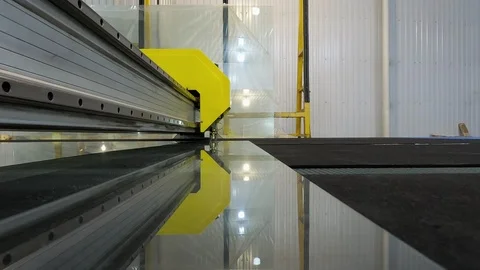 Cutting glass by CNC.Machine for automatic cutting of float glass.Close-up. 스톡 동영상 123948897