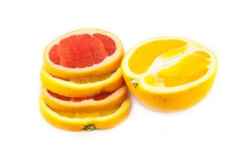 Cutting grapefruit and orange Stock Photos