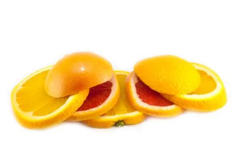 Cutting grapefruit and orange Stock Photos