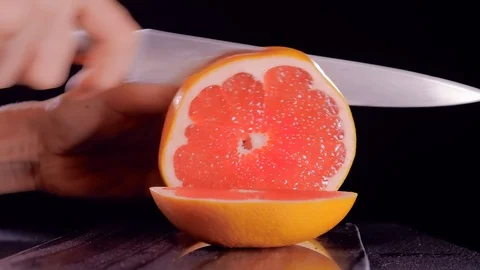 Cutting Grapefruit, beautiful macro Stock Footage 122683718