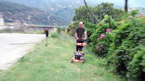 Cutting the grass Stock Footage 68828955