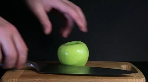 Cutting green apple Stock Footage 10831923