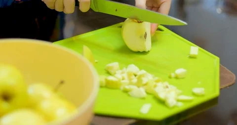 Cutting green apple on table Stock Footage 129426896