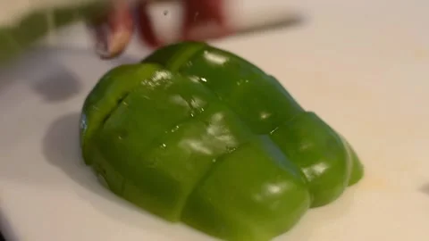 Cutting Green Bell Pepper Stock Footage 136059343