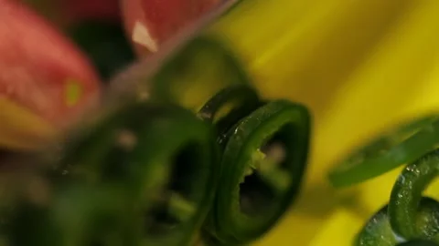 Cutting green Jalapenos in slow motion Stock Footage 149118672