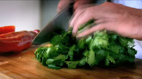 Cutting a Green leafs of Coriander Stock Footage 731545
