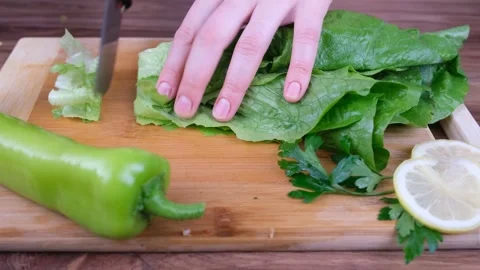 Cutting green vegetables Stock Footage 232853606