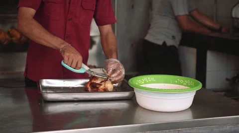 Cutting grilled chicken Stock Footage 61023842