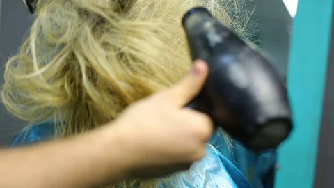 Cutting hair at salon Stock Footage