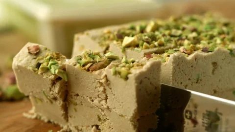  Cutting Halva with pistachio knife Stock-Footage 81806608