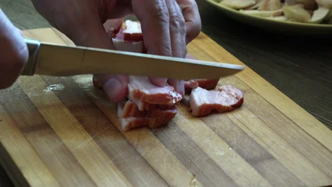Cutting ham for pizza 4K Stock Footage 130879939