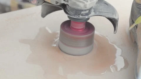 Cutting a hole in a tile with a circular electrical cutter. Men at work. 库存影片 342926008