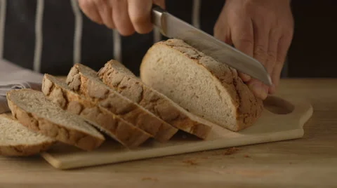 Cutting a home made bread Stock Footage 67531064