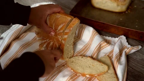 Cutting homemade bread Stock Footage 132069545