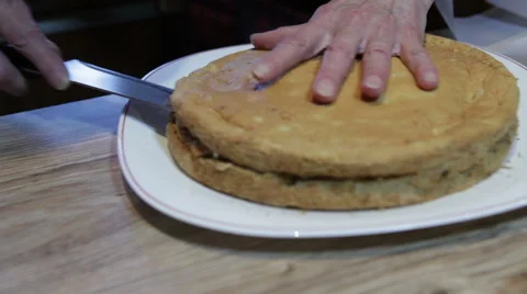 Cutting homemade cake Stock Footage 58217913