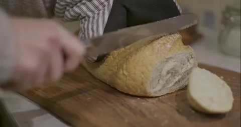 Cutting Hot Bread Stock Footage 261901731