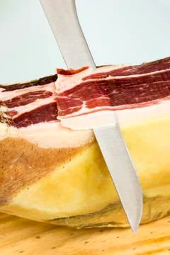 Cutting iberian ham Stock Photos