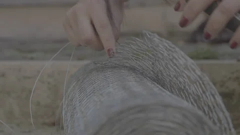 Cutting an iron grid 動画素材 147655602