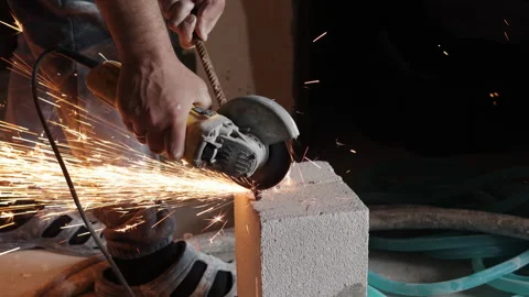 Cutting iron rods, manual machine, abrasive disk Stock Footage 328915642