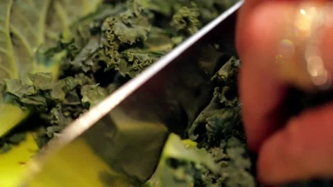 Cutting kale in slow motion Stock Footage 149118668