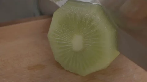 Cutting Kiwi (1) Stock Footage 157885009