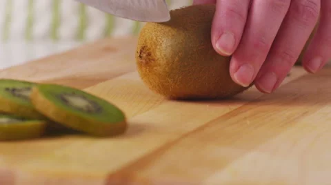 Cutting kiwi fruit, closeup Stock-Footage 62282776