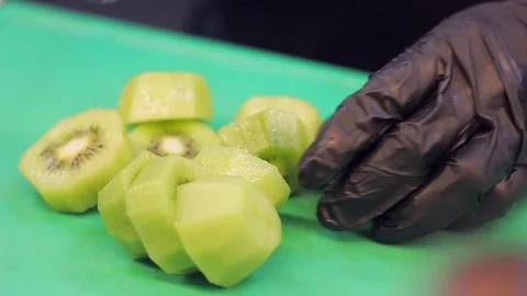 Cutting kiwis Stock Footage 74502412