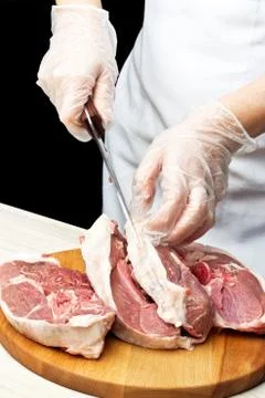 Cutting lamb meat Foto stock
