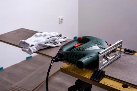 Cutting the laminate Stock Photos