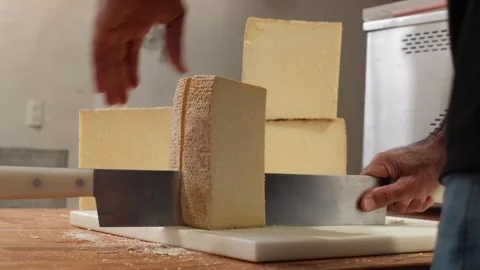 Cutting Large Cheese Blocks in Dairy Processing Stock Footage 316272508