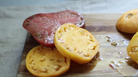 Cutting large fresh tomatoes, 4k, home kitchen Stock Footage 248542240