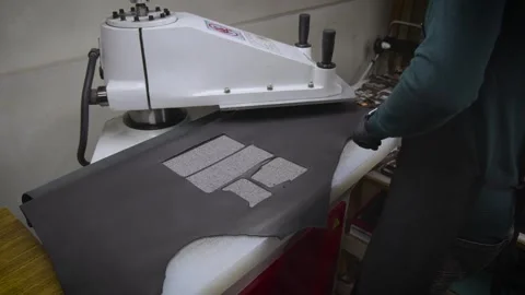 Cutting leather elements on a press machine Stock Footage 266139109