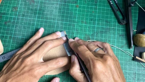 Cutting Leather wallet Stock Footage 304340597