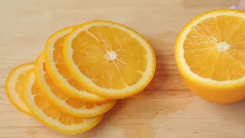 Cutting lemon and orange. Preparation of summer cocktails in fruit. Stock Footage 107650506