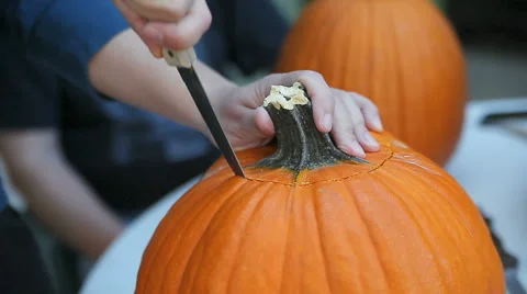 Cutting lid from pumpkin Stock Footage 42935707