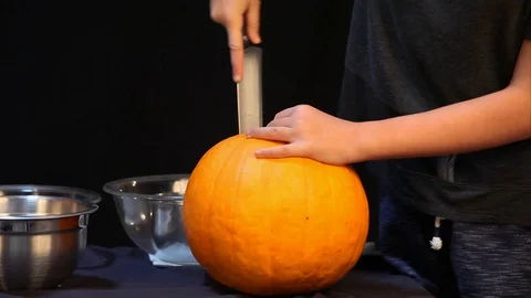 Cutting Lid Off Pumpkin Video stock 97598175