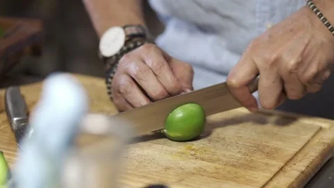 Cutting a lime into a wedge  Stock Footage 145354770