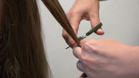Cutting long hair, close up Stock Footage 95779922