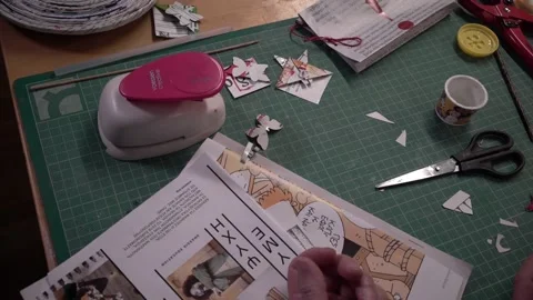 Cutting magazine to upcycle Stock Footage 167741943