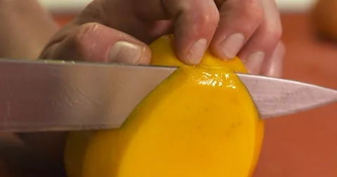 Cutting of a mango Stock Footage 89399604